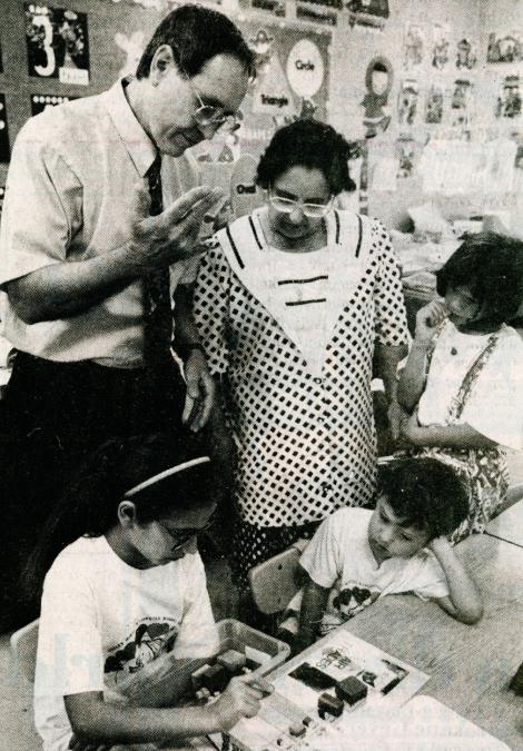 Dr. Paul Shoecraft explains MOVE IT Math to principal from Guadalajara.