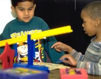 Elementary school children discovering equals as balanced