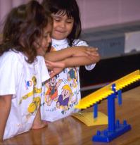 Kindergartners signal equals for math balance